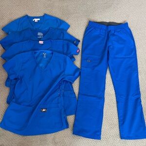 4 Scrub tops and 1 scrub pants xs royal blue